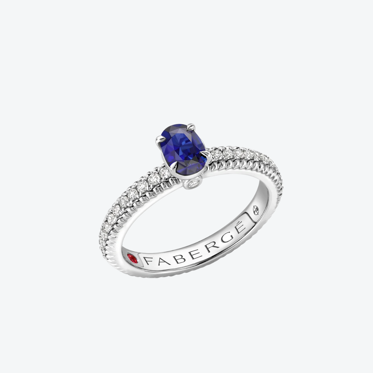 Fabergé Oval Blue Sapphire set Fluted ring with diamonds